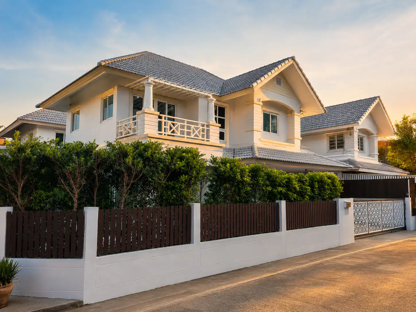 Two-storey detached house with a private garden at Baan Suan Racha, Ramintra, available for sale and rent near public transportation.